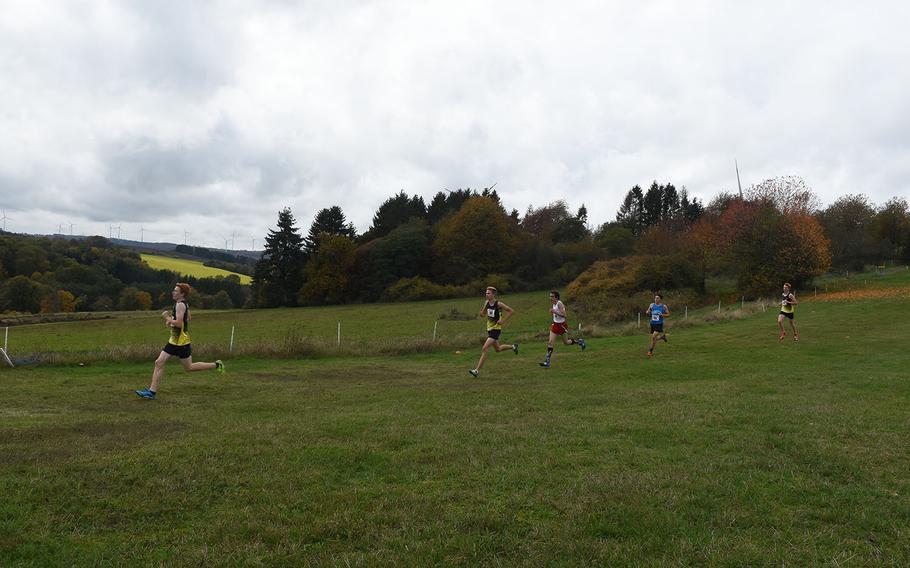 Stuttgart's Tyler Wilson leads a pack of runners at the DODEA-Europe cross country championships on Saturday, Oct. 19, 2019, in Baumholder, Germany. Wilson finished second in the boys race and helped lead the Panthers to a Division 1 team title.