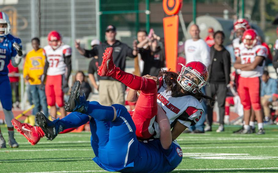 Kaiserslautern's Nelson Rivas is sacked by Ramstein's Teddy Ward during a game at Ramstein Air Base, Germany, Saturday, Oct. 26, 2019. Ramstein won the game 35-21. 