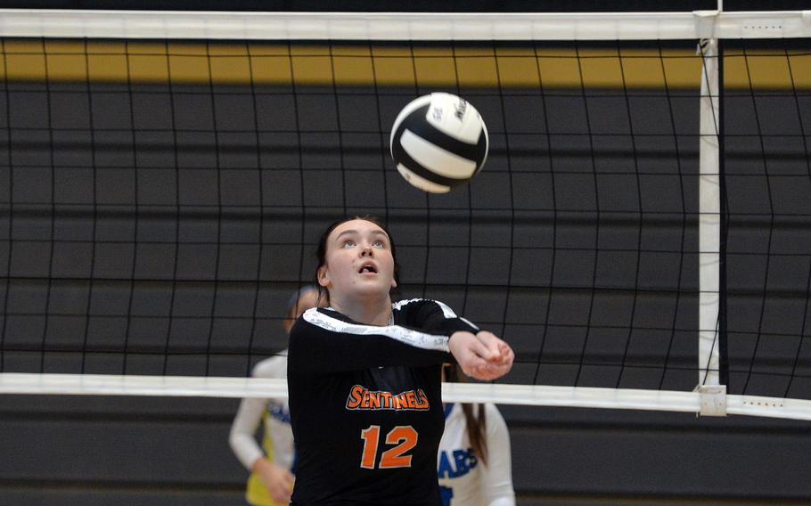 Spangdahlem's Molly Branson bumps the ball in the Sentinels Division III match against Sigonella at the DODEA-Europe volleyball championships in Ramstein, Germany, Oct. 31, 2019. Sigonella won 25-18, 25-21, 10-15.