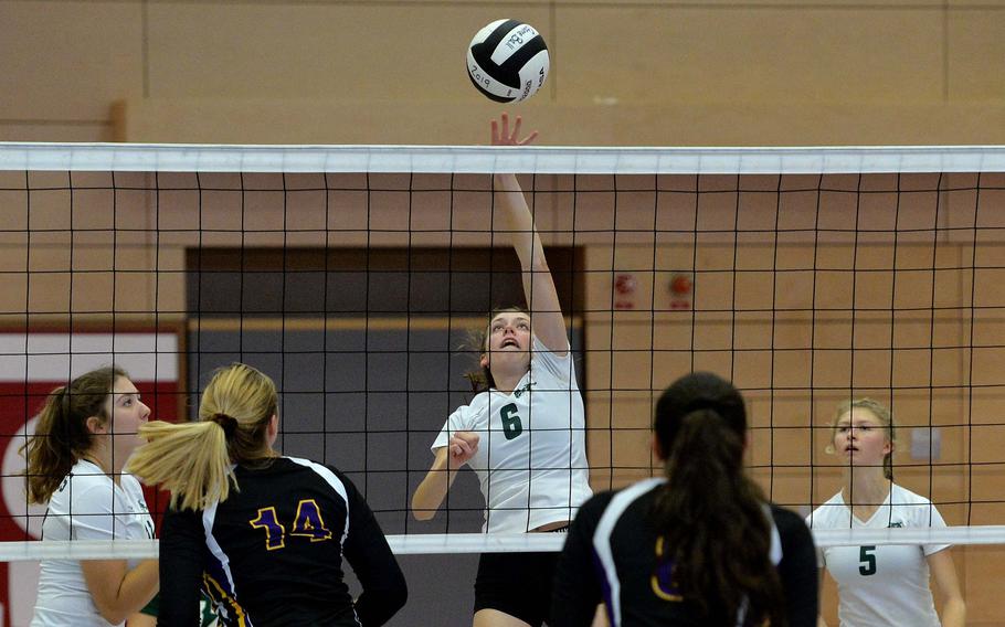 Naples' Hayley O'Harrah slaps the ball over the net in a Division II match at the DODEA-Europe volleyball finals in Kaiserslautern, Friday, Nov. 1, 2019. Naples won 25-14, 25-19.
