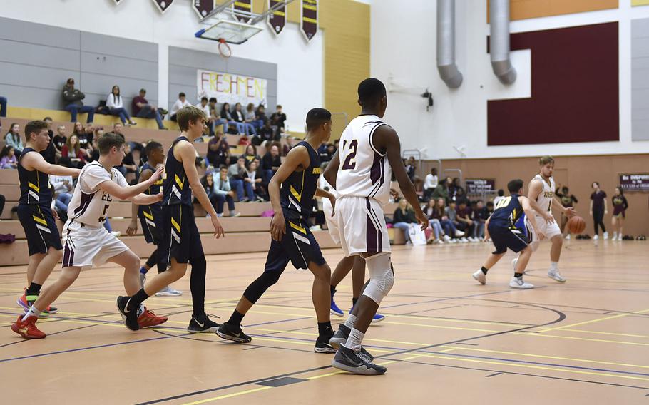 The Vilseck Falcons and Ansbach Courgars battle it out during Saturday's game held at Vilseck. The Vilseck Falcons soared past the Ansbach Cougars in both girls and boys varsity basketball games.