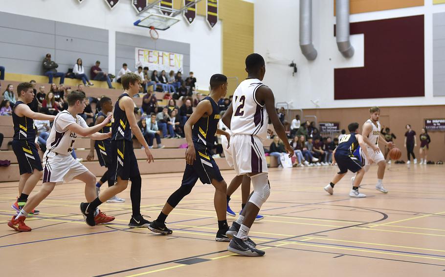 The Vilseck Falcons and Ansbach Courgars battle it out during Saturday's game held at Vilseck. The Vilseck Falcons soared past the Ansbach Cougars in both girls and boys varsity basketball games.
