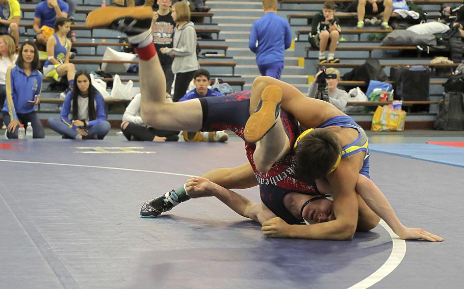Lakenheath's Philip Severance, bottom, wrestles against Weisbaden's Jack Rohling, top, at the Lakenheath season opening competition held Saturday at RAF Lakenheath.