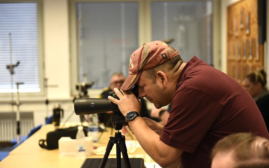 John Sabala, the marksmanship coach at Vilseck, sights in on a target during a marksmanship competition held at Vilseck, Saturday, Dec. 14, 2019. The competition included competitors from Stuttgart, Hohenfels, Ansbach and Vilseck high schools.