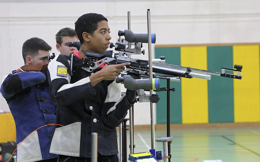 Wiesbaden's Jaden Anderon prepares to fire a shot at a target during a marksmanship competition held at RAF Alconbury, Saturday, Dec. 14, 2019.
