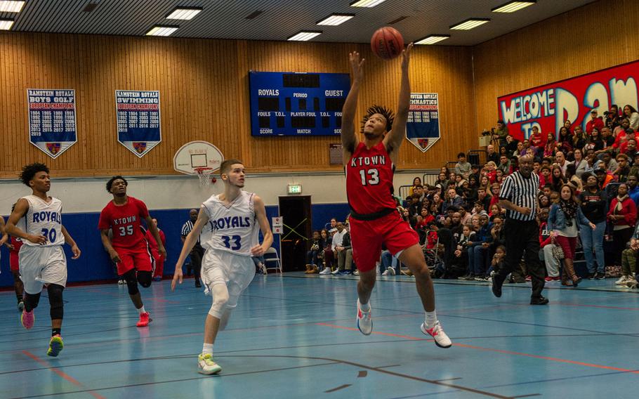 Kaiserslautern's Danus Camp catches the ball on a fast break during a basketball against Ramstein at Ramstein High School, Germany, Dec. 17, 2019. Ramstein won the game 72-56. 

