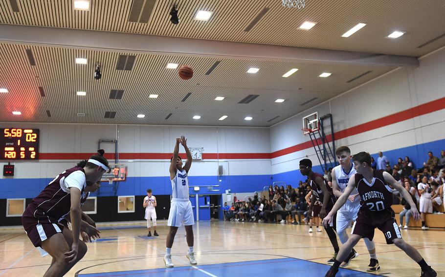 Hohenfels Tiger Mason Morcilla scores against the AFNORTH Lions during Friday's boys basketball game, which was held at Hohenfels. The Tigers beat the Lions 59-28.  