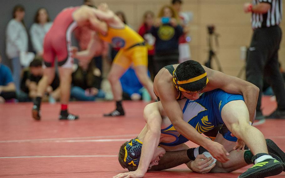 High school wrestlers from across Europe participate in a tournament at Kaiserslautern High School, Germany, Saturday, Jan. 18, 2020.   