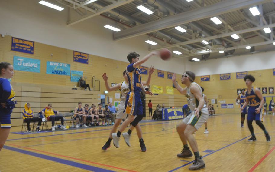 Wiesbaden's Levi Ferguson passes the ball to a teammate during a game against SHAPE. The Warriors beat the Spartans 61-35. 