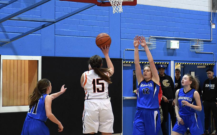 Spangdahlem Sentinel Emerson Retka prepares to shoot the ball during Saturday's girls varsity basketball game against the Hohenfels Tigers, held at Hohenfels. The Sentinels beat the Tigers 41-39.