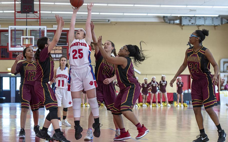 Ramstein's Linda Naglack takes a shot during Saturday's girls varsity basketball game against Baumholder, held at Baumholder. Ramstein won the game 42-9.