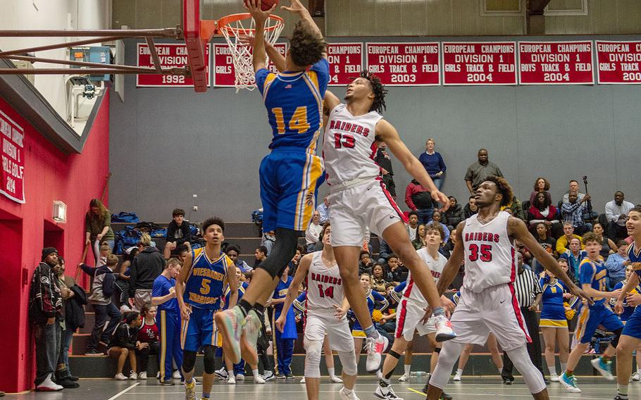 Wiesbaden's Dom Bivins drives for a lay-up during a basketball game against Kaiserslautern in Kaiserslautern, Germany, Friday, Jan. 31, 2020. Wiesbaden won the game 76-75.  