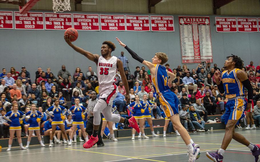 Kaiserslautern's Tre Dotson drives for a lay-up during a basketball game against Wiesbaden in Kaiserslautern, Germany, Friday, Jan. 31, 2020. Wiesbaden won the game 76-75.  