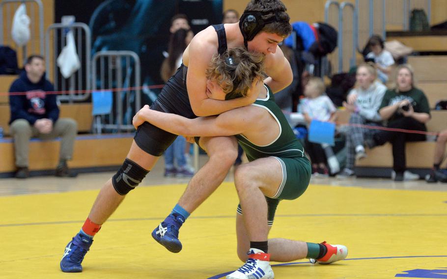 Ankara's Roberts Swart, left, grapples with Matteo Toliver of Naples in a 160-pound match on the first day of action at the DODEA-Europe wrestling championships in Wiesbaden, Germany, Friday, Feb. 14, 2020. Roberts won the second round bout.