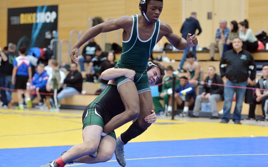 AFNORTH's Iosefa Palmer tries to drag down Naples' Choosen Lokombe in a 138-pound match at the DODEA-Europe wrestling championships in Wiesbaden, Germany, Feb. 14, 2020. Lokombe went on to win.