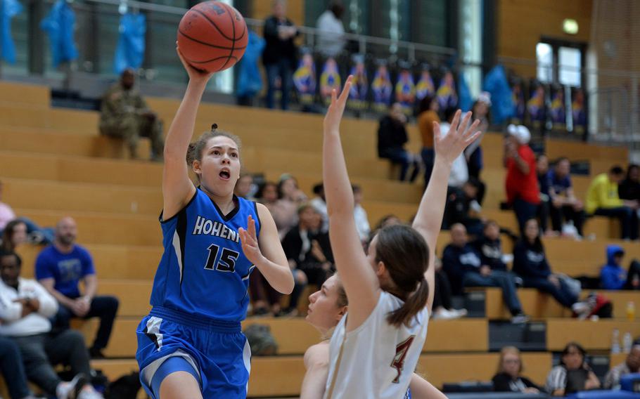 June Smith of Hohenfels shoots over Johanne Sandal of AFNORTH in a Division III semifinal at the DODEA-Europe basketball championships in Wiesbaden, Germany, Friday, Feb. 21, 2020. Hohenfels won 36-31 to advance to the finals.