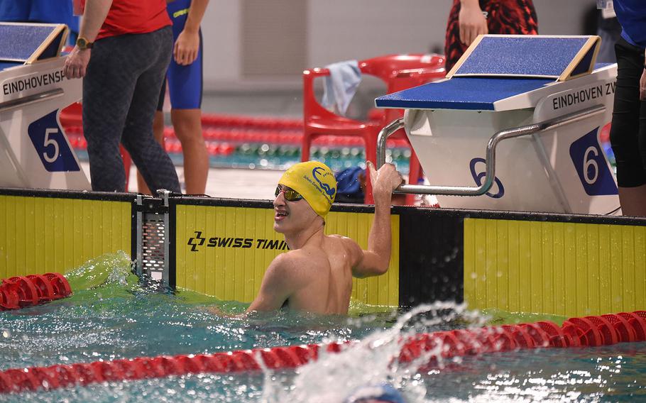 European School of Brussels swimmer Rodrigo Alquezar looks up after completing the boys 15-16-year-old 100-meter freestyle during the  European Forces Swim League championships in Eindhoven, Netherlands, Saturday, Feb. 29, 2020.