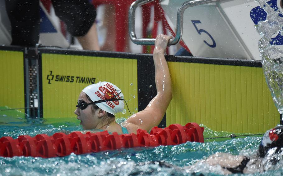 Stuttgart swimmer Mia McBride looks up after competing in the girls 15-16-year old 100-meter freestyle during the European Forces Swim League championships in Eindhoven, Netherlands, Saturday, Feb. 29, 2020.