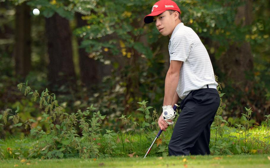 Sigonella's Evan Cantwell watches his chip sail to the green in opening day action at the DODEA-Europe golf championships at Rheinblick Golf Course in Wiesbaden, Germany, Wednesday, Oct. 7, 2020.