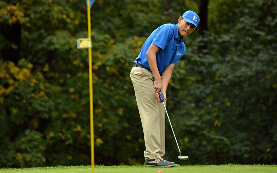 Wiesbaden's Gilbert Bustillos watches his putt head towards the pin in opening day action at the DODEA-Europe golf championships at Rheinblick Golf Course in Wiesbaden, Germany, Wednesday, Oct. 7, 2020.