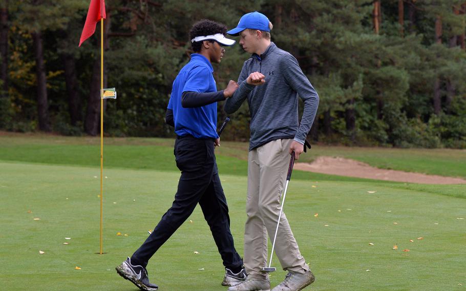 Runner-up Ben Todman of Ramstein, left, congratulates Wiesbaden's Clayton Shenk on defending his boys DODEA-Europe golf title at Rheinblick Golf Course in Wiesbaden, Germany, Thursday, Oct. 8, 2020. Shenk beat Todman by a point, 85-84, using the modified Stableford point system.