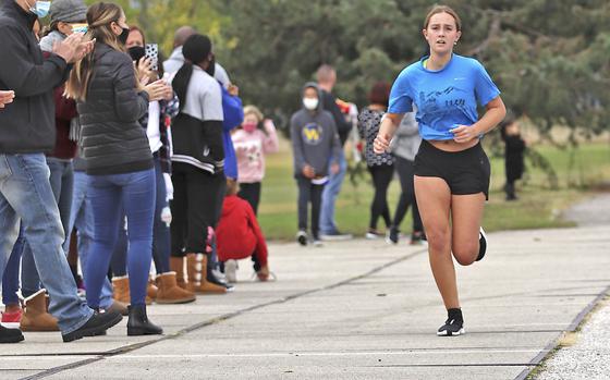Sirin Whitcomb sprints to the finish line during Saturday's virtual cross country meet at Aviano. A total of 15 runners competed in the event where Whitcomb finished with a time of 34 minutes, 38 seconds.