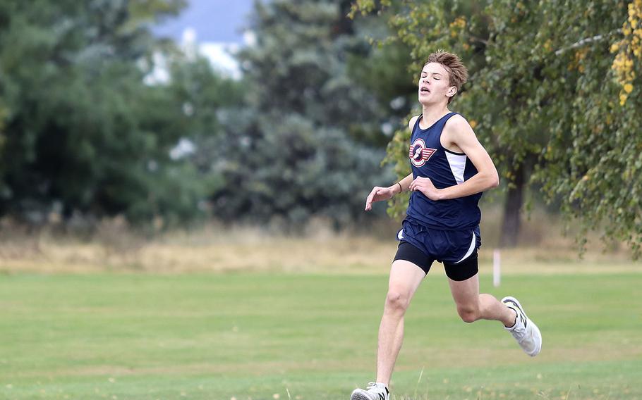 Michael O'Brien sprints to the finish line in Saturday's cross country competition in Aviano.  O'Brien finished first in the boys' group with a time of 19 minutes, 22 seconds.