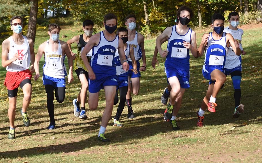 Runners sprint from the starting line at the DODEA-Europe non-virtual cross country championship on Saturday, Oct. 24, 2020. Teams from Ramstein, Wiesbaden, Kaiserslautern and Stuttgart competed in the large schools division race. Due to coronavirus restrictions, only teams from Germany were able to compete at Seewoog Park in Ramstein-Miesenbach, Germany.