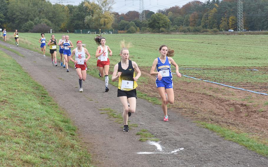 Stuttgart's Ella Bishop and Wiesbaden's Kaitlyn Taylor took the lead early on at the DODEA-Europe non-virtual cross country championship on Saturday, Oct. 24, 2020, at Seewoog Park in Ramstein-Miesenbach, Germany. Bishop won the race on the 3.1-mile course in 20:05.22.
