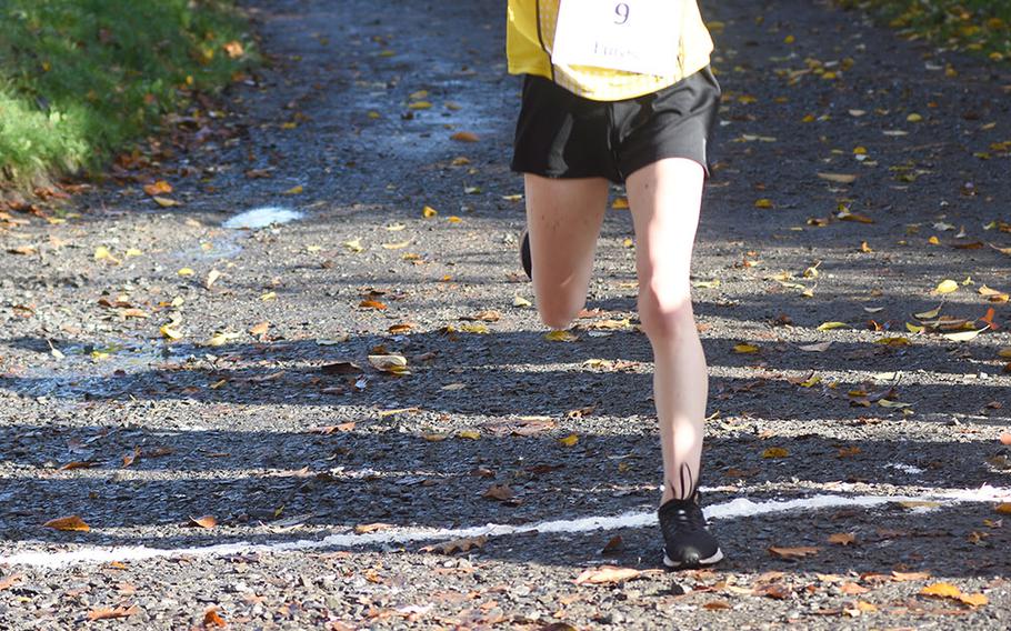 Stuttgart's Ella Bishop crosses the finish line first at the DODEA-Europe non-virtual cross country championship on Saturday, Oct. 24, 2020, at Seewoog Park in Ramstein-Miesenbach, Germany. 