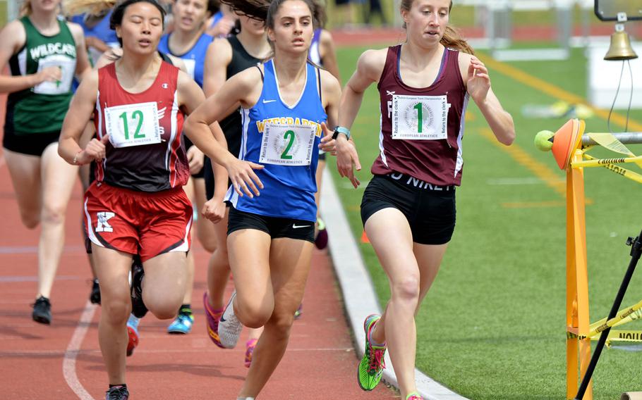 Runners head into the last lap of the girls 800-meter race at the 2019 DODEA-Europe track and field championships in Kaiserslautern, Germany, during the last time finals were held. Last year's track season was canceled due to the coronavirus. This year, the championships will only be virtual. 