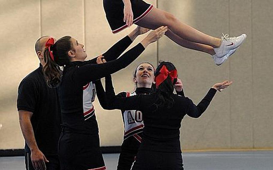 The AOSR Falcons cheer team perform at the DODDS Europe Cheer Championships in Mannheim, Germany, on Saturday.
