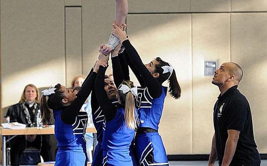 The Hohenfels Tigers cheer squad compete at the  DODDS Europe Cheer Championshipsin Mannheim, Germany.