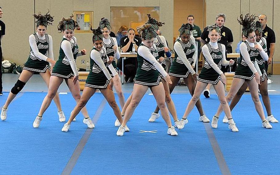 The AFNORTH Lions cheer team struts its stuff at the DODDS Europe Cheer Championships in Mannheim, Germany.