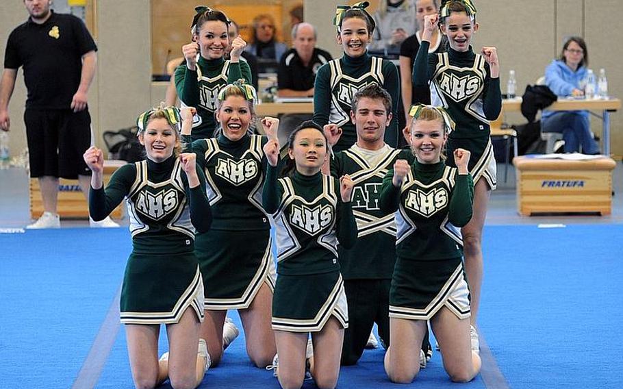 The Alconbury Dragons cheerleaders show their spirit at the DODDS Europe Cheer Championships in Mannheim, Germany.