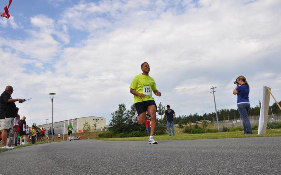 Edward Perez, 42, of Bamberg, Germany comes down the home stretch Saturday in Grafenwöhr at the U.S. Forces-Europe Army 10-Miler. Perez finished with a time of 78 minutes, 38 seconds.