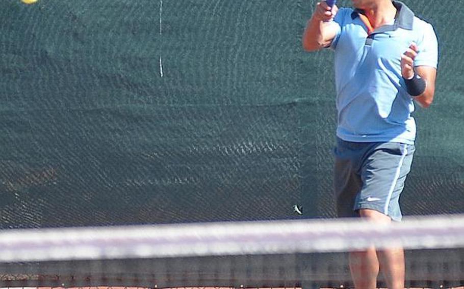 Phillip Ramil of Ramstein hits a forehand in the first set of the men's Open final at the U.S. Forces Europe Tennis Championships tennis championships in Heidelberg, Germany, on Saturday. Ramil won in three sets.