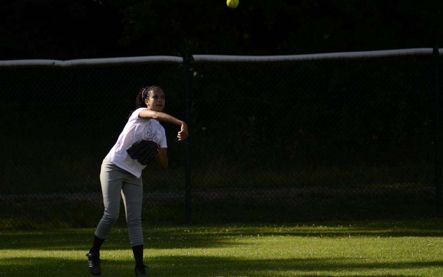 Brianna Doss, left fielder for the 13-14 year-old All-Stars, throws a ball back to the infield during a July 6, 2012, practice at Ramstein Air Base.