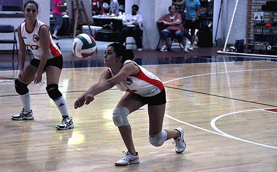 AOSR's Cat Fantetti rushes forward to make a dig and keep the ball in play during her team's 25-14, 33-31, 25-15 victory over Aviano on Friday night.