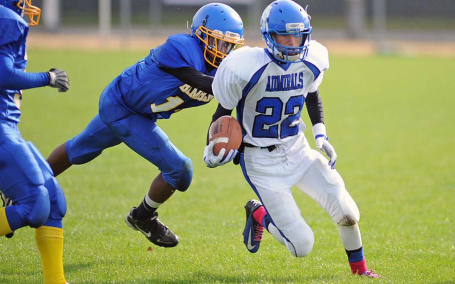 Bamberg's Leontae Lockett closes in on Rota's Mason Crowell in a Division III football game in Bamberg, Saturday. The Barons defeated the visiting Admirals 22-12.