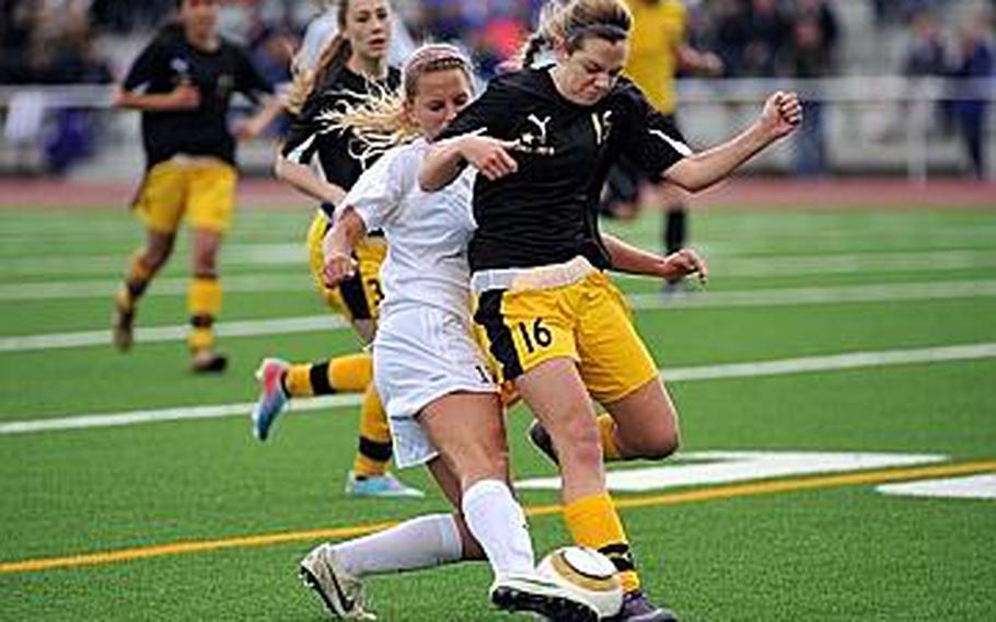 Patch's Mallory Flynn, right, stops Ramstein's Shannon Guffey from centering the ball in the Division I final at the DODDS-Europe soccer championships in Kaiserslautern, Germany, Thursday. Patch won 1-0 to take the title.