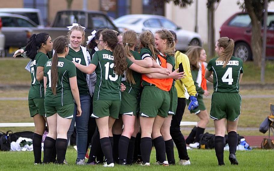 Alconbury celebrates its win over Lakenheath during the last game of the regular season at RAF Lakenheath, England, Friday, May 12, 2017.