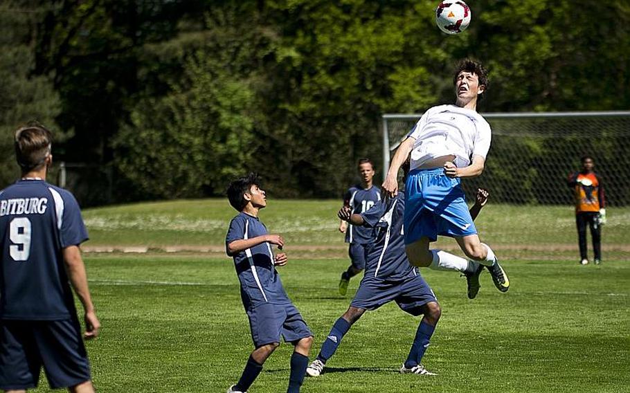 Marymount's Antonio Di Tommaso, right, jumps for a header over Bitburg's Luis Funez during the DODEA-Europe soccer tournament in Landstuhl, Germany, on Wednesday, May 17, 2017. Marymount won the Division II match 3-1.

MICHAEL B. KELLER/STARS AND STRIPES