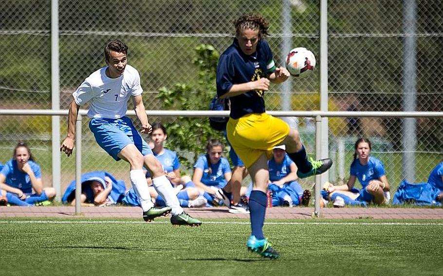Marymount's Julien Van Hensbeng, left, passes the ball past Florence's Gabriele Lapi during the DODEA-Europe soccer tournament in Landstuhl, Germany, on Wednesday, May 17, 2017. Marymount won the Division II match 5-2.

MICHAEL B. KELLER/STARS AND STRIPES