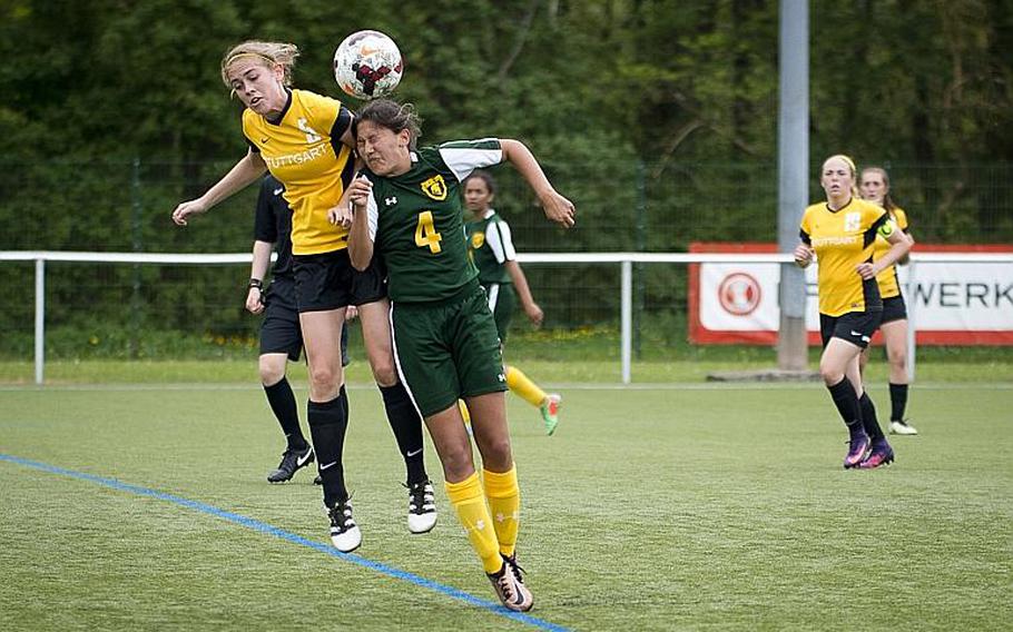 Stuttgart's Caylee Creer, left, and SHAPE's Isabella Ortez jump for a header during the DODEA-Europe soccer tournament in Reichenbach, Germany, on Thursday, May 18, 2017. Stuttgart won the Division I match 7-0 and advanced to the semifinals.

MICHAEL B. KELLER/STARS AND STRIPES