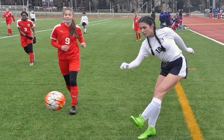 Rocio Fernandez of Ramstein sends a cross towards the goal in a game last season against the Kaiserslautern Raiders. DODEA-Europe has canceled the first two weeks of its upcoming spring sports season due to coronavirus concerns.