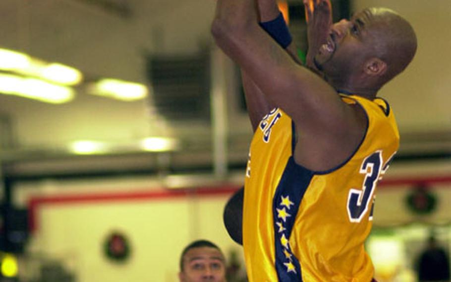 Heidelberg big man Rodney Bailey drains two of his 16 points against Darmstadt during the final game of the 22nd Annual Kaiserslautern Invitational Christmas Basketball Classic in Kaiserslautern, Germany, on Sunday.