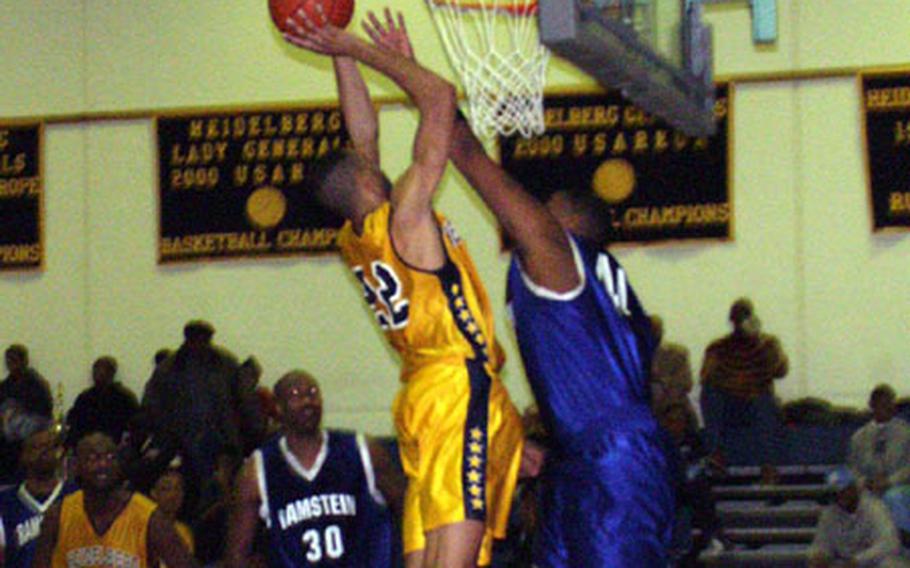 Danny Jones (22) of Heidelberg puts up a shot against the defense of Ramstein's Dre Chilton during the Generals' 63-48 victory Monday in the championship game of the sixth annual Martin Luther King Jr. Basketball Tournament. Jones was voted the tourney's most valuable player.