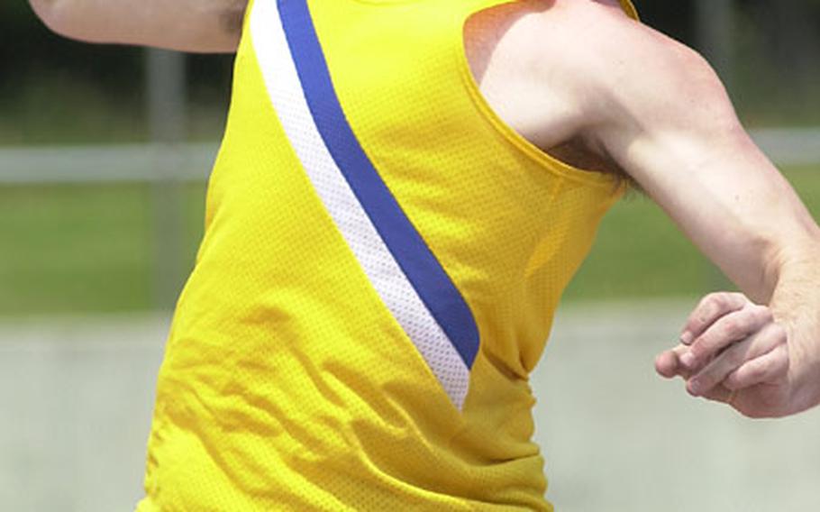 Leighton Gill of the Christian Academy In Japan puts the shot during Saturday&#39;s Kanto Plain Association of Secondary Schools season-ending track and field championships. Gill won the event with a school-record put of 13.74 meters.