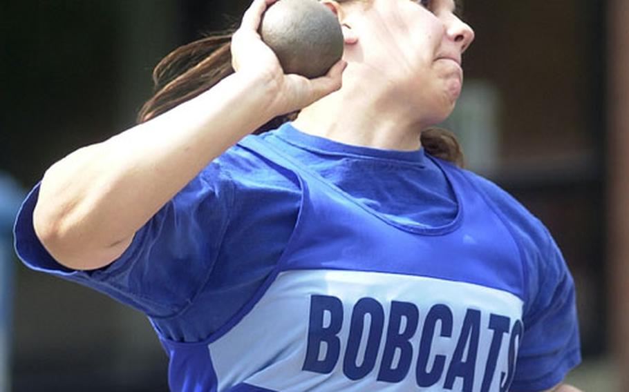 London Central&#39;s Nicole Lasseter hurls a shot put during the DODDS Division I Track and Field Championships in Wiesbaden, Germany, on Saturday.